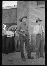 Phoenix Arizona 1940s orchestra member tuning violin outside grocery store picture