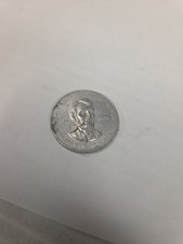 Shell's Mr. President Coin Game-Lincoln-Silver-Tone . picture