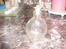 ANTQ. EMBOSSED HOLY WATER BOTTLE CROWN METAL CORK STOPPER  3.75” picture