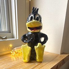 Daffy Duck Looney Tunes Ceramic Figurine Glossy Black Yellow. Hand Crafted clay picture