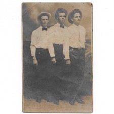 Antique RPPC Real Photo Postcard 3 Handsome Young Men Hats Bow Ties Trio Boys picture
