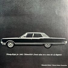 Vintage 1965 98 Luxury Sedan Oldsmobile Black Leather Texture Background Ad picture