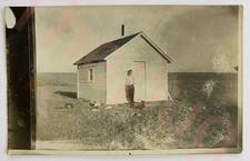 Antique RPPC Dog and Man Shanty Pioneer Homestead Prairie Plains Real Photo CYKO picture
