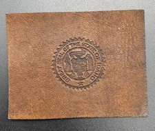c1910 L23 Idaho State Seal Tobacco Leather Antique Brown 2x2.5 picture