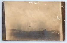 RPPC Biplane Aerial Blurry Image Bridge Real Photograph Postcard c.1910 DAMAGE picture