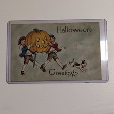 Post Card - Vintage Halloween - Boy & Girl Carrying Jack O' Lantern picture