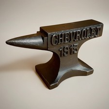 Chevrolet 1913 Cast Iron Anvil Paperweight picture