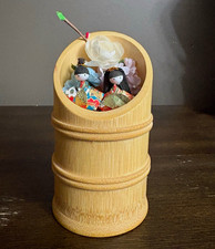 japanese miniature hina dolls in bamboo cup w/ floral decoration picture
