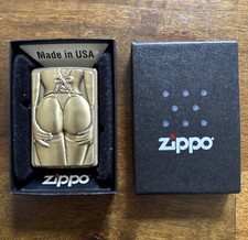 NEW RARE ZIPPO LIGHTER BRASS SEXY GOLDEN STOCKING GIRL TRICK LIMITED TO 2500 picture