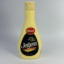 Vtg 70s 80s Jergens Extra Dry Skin Lotion 10 FL OZ Yellow Plastic Prop 50% Full picture