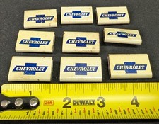 Lot of 9 Chevrolet Bowtie sign metal clip binders from Chevrolet Plant picture