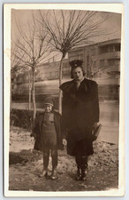 Original Old Vintage Antique Postcard Real Photo Lady Boy Coat Hat Building picture