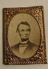 1864 ABRAHAM LINCOLN PRESIDENTIAL CAMPAIGN BRASS FRAME 28 MM CARDBOARD PHOTO  picture