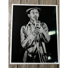 Vintage Black and White Photo Of Jazz Musician With Microphone picture