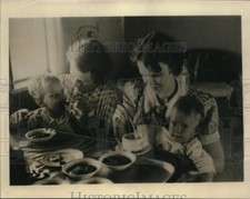 1940 Press Photo Evacuees Fed Aboard Trans-Pacific Plane Headed for America picture