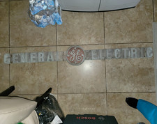 General Electric GE Advertising Sign in Gray & Red Colors, Sign Type picture