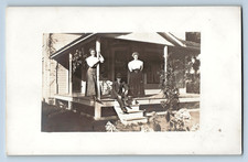 1908 RPPC Michigan Family on Front Porch House Women Man Photo Postcard -1360 picture