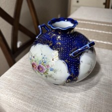Cobalt blue antique porcelain vase featuring hand-painted floral details picture