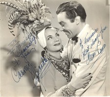 BRAZILIAN BOMBSHELL CARMEN MIRANDA & CESAR ROMERO, SIGNED VINTAGE STUDIO PHOTO. picture
