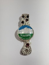 Vintage Harrahs Reno And Lake Tahoe Casino Bottle Opener picture