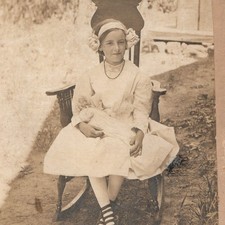 c1910s Girl in Rocking Chair Doll Striped Stockings Outdoor Mounted Photo 9