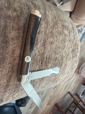 VINTAGE COLONEL COON KNIFE  ONE ARM BANDIT KNIFE picture