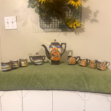 9-Piece Multicolor Glazed Ceramic/Porcelain Figural Tea Set, Teapot + 6 Cups picture