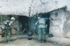 Vietnam  War  Photos --    Soldiers Seaching Village For Viet Cong picture