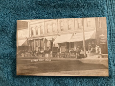 RPPC Union City Michigan Busy Grocery/Bakery Shop/Horse & Carriages c1910 picture