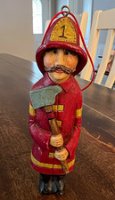 Vintage Kurt Adler carved-style resin firefighter Christmas tree ornament picture