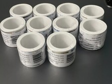 10 rolls of 100 USPS postage stamps, totaling 1000 pieces picture