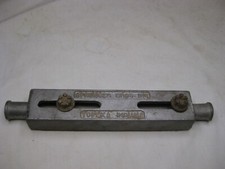 vintage SPRUNGER BROS. INC TOPEKA INDIANA metal marked 21-102 band saw part ? picture