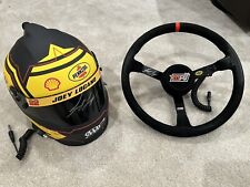 Joey Logano  Used Signed Steering Wheel /Full Size Autographed Replica helmet picture