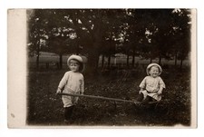 Two Children w/Wagon Playing in a Field Real Photo Postcard RPPC Unposted picture