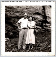 Vtg B&W Snapshot Smiling Couple Posing Outdoors By Rock Wall 1940s picture