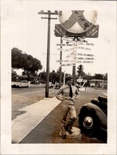 WWII US Serviceman at Crossroads of the Pacific Signpost Photograph Hawaii 1940s picture