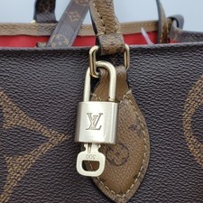Authentic Louis Vuitton Gold Padlock In Excellent Shiny Brass 011526 picture