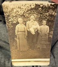RPPC Vintage Postcard Family Baby Post Mortem Down Syndrome ? Child Peeking Out picture