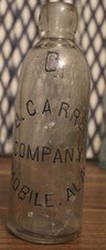 E. Carre Company Mobile Alabama Embossed Clear Hutchinson Bottle picture