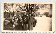 Portrait Of Two Young Boys And Girl By Car In The Winter Snow 1940's picture