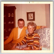 Vtg Color Snapshot Smiling Couple Yellow Cardigan Striped Dress Armchair 1970 picture