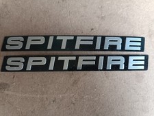  2 TRIUMPH SPITFIRE BADGE INSERTS EMBOSSED. NOS? Bargain price.  picture
