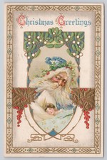 1912 Christmas Greetings Blue Santa Sleeping Child Embossed Antique Postcard picture