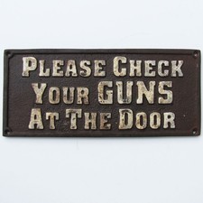 old west hotel saloon cast iron sign PLEASE CHECK YOUR GUNS AT THE DOOR plaque picture