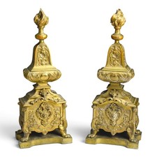 A pair of Régence style gilt-bronze chenets picture