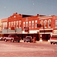 1984 Tecumseh, NE Downtown Square Storefronts Snapshot Photo Signs Trucks Cars picture