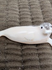 Vintage Hand Carved Natural Bone Seal Figurine Signed Scrimshaw Art Miniature picture