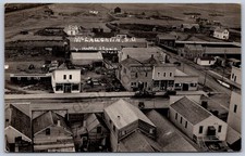 K41/ McLaughlin South Dakota Postcard RPPC c1910 Pages Store Homes 288 picture