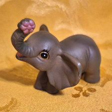 Gray Baby Elephant Figurine Raised Trunk Pink Flower Plastic picture
