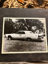 Vintage Black & White Photo of Classic Car Rear Side View - 1960s picture